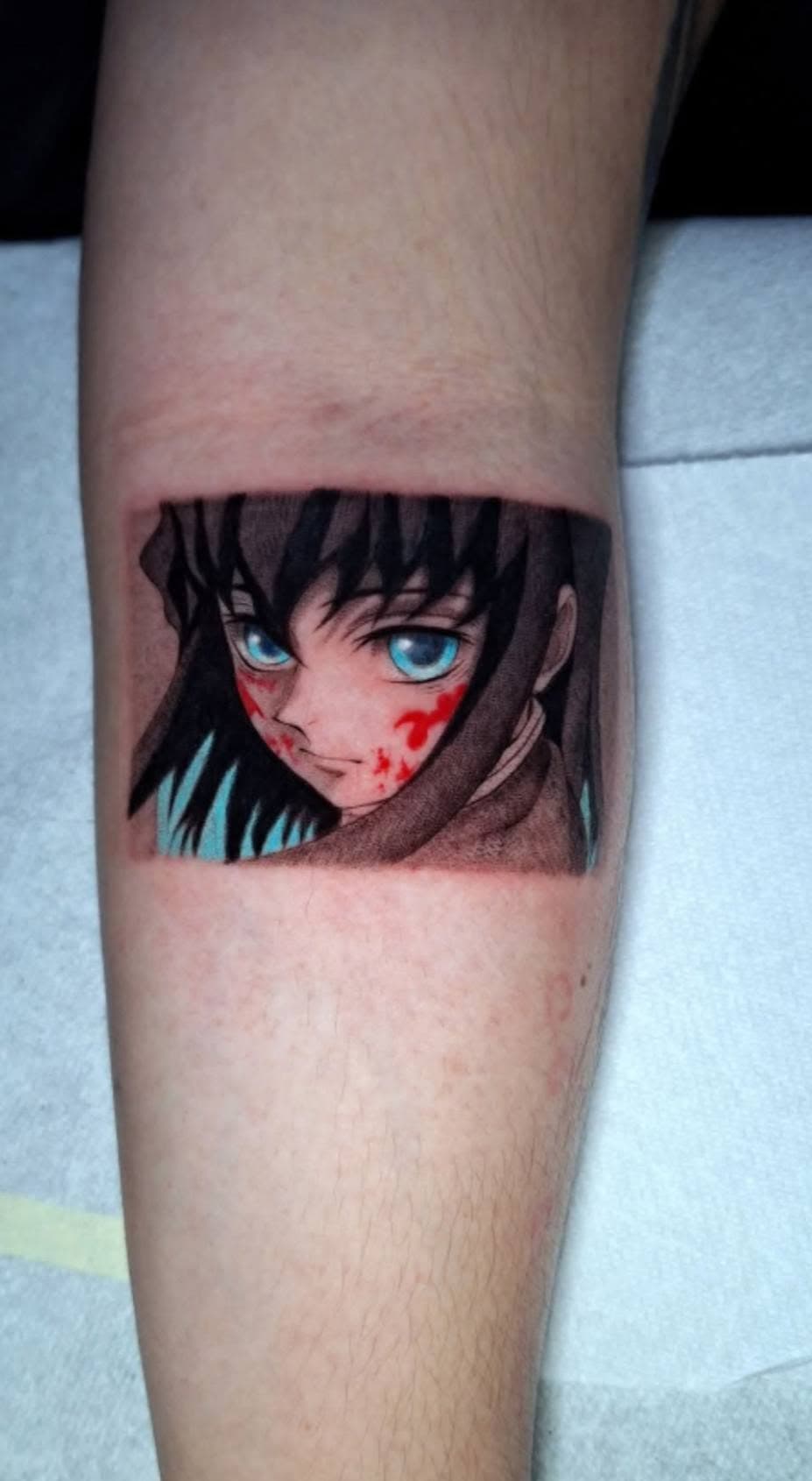 Fine-line tattoo portrait — determined expression, strong jaw
