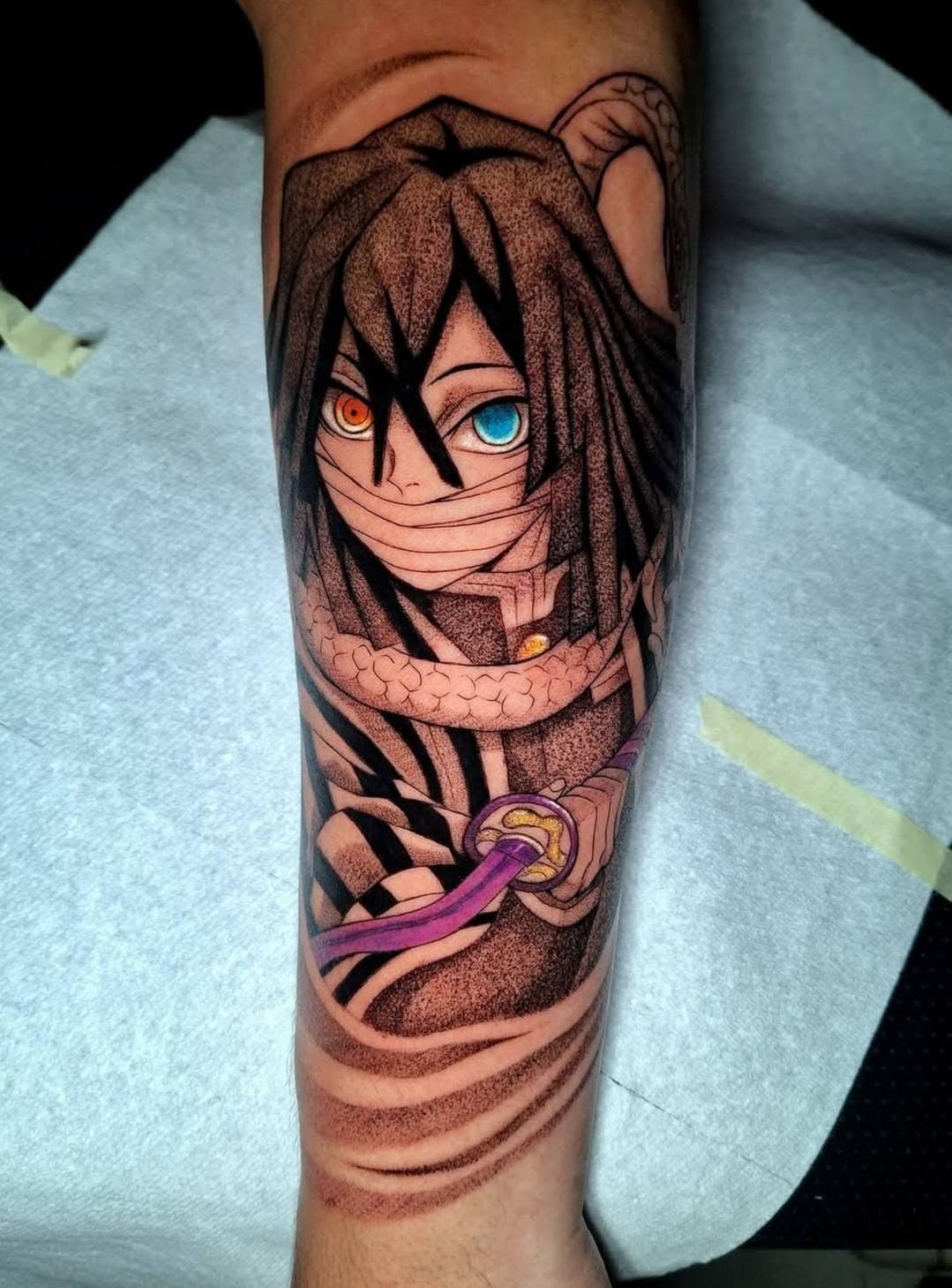 Anime tattoo of a figure ascending, breath-style energy lines