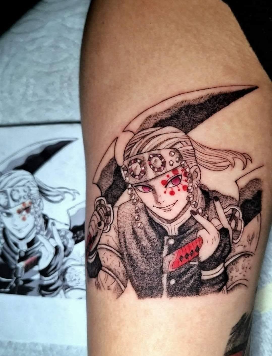 Anime-style tattoo close-up — eye detail and hatched shadow