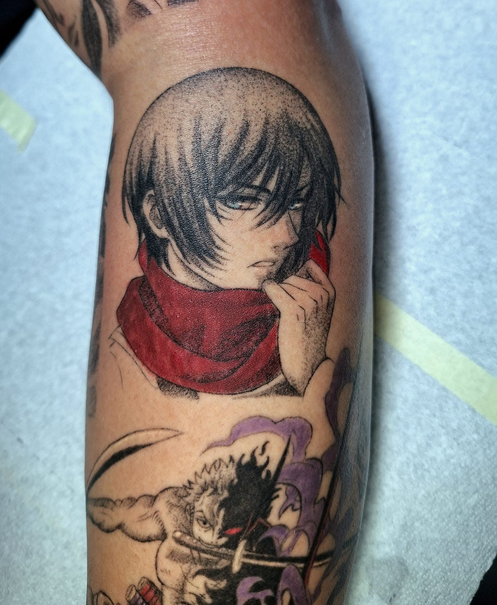 Healed anime blackwork tattoo