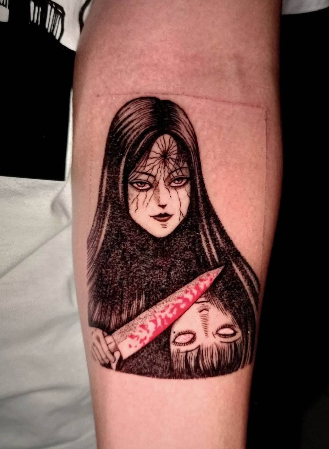 Horror manga-style tattoo in blackwork