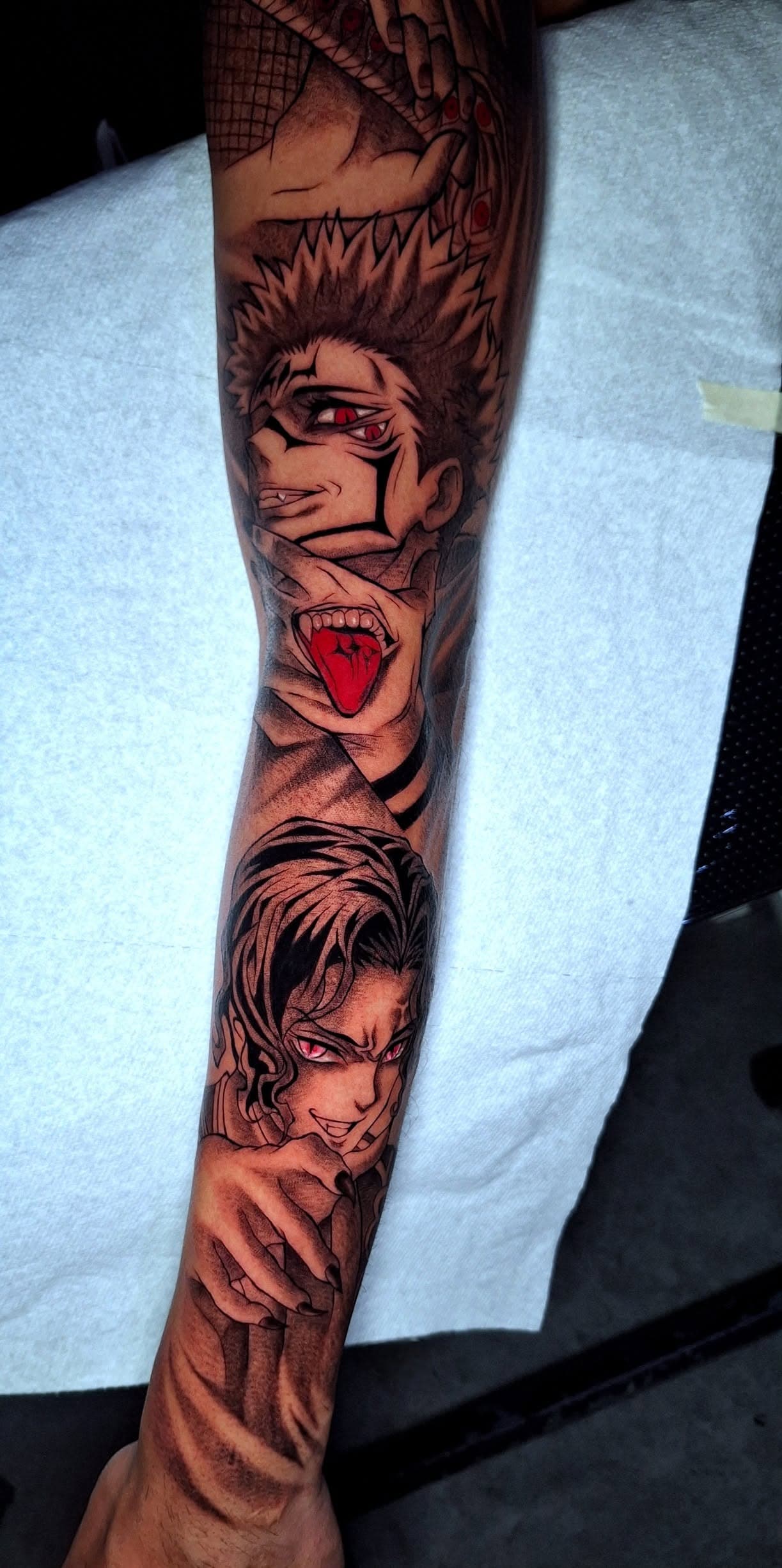 Manga-inspired blackwork tattoo — May–October 2025