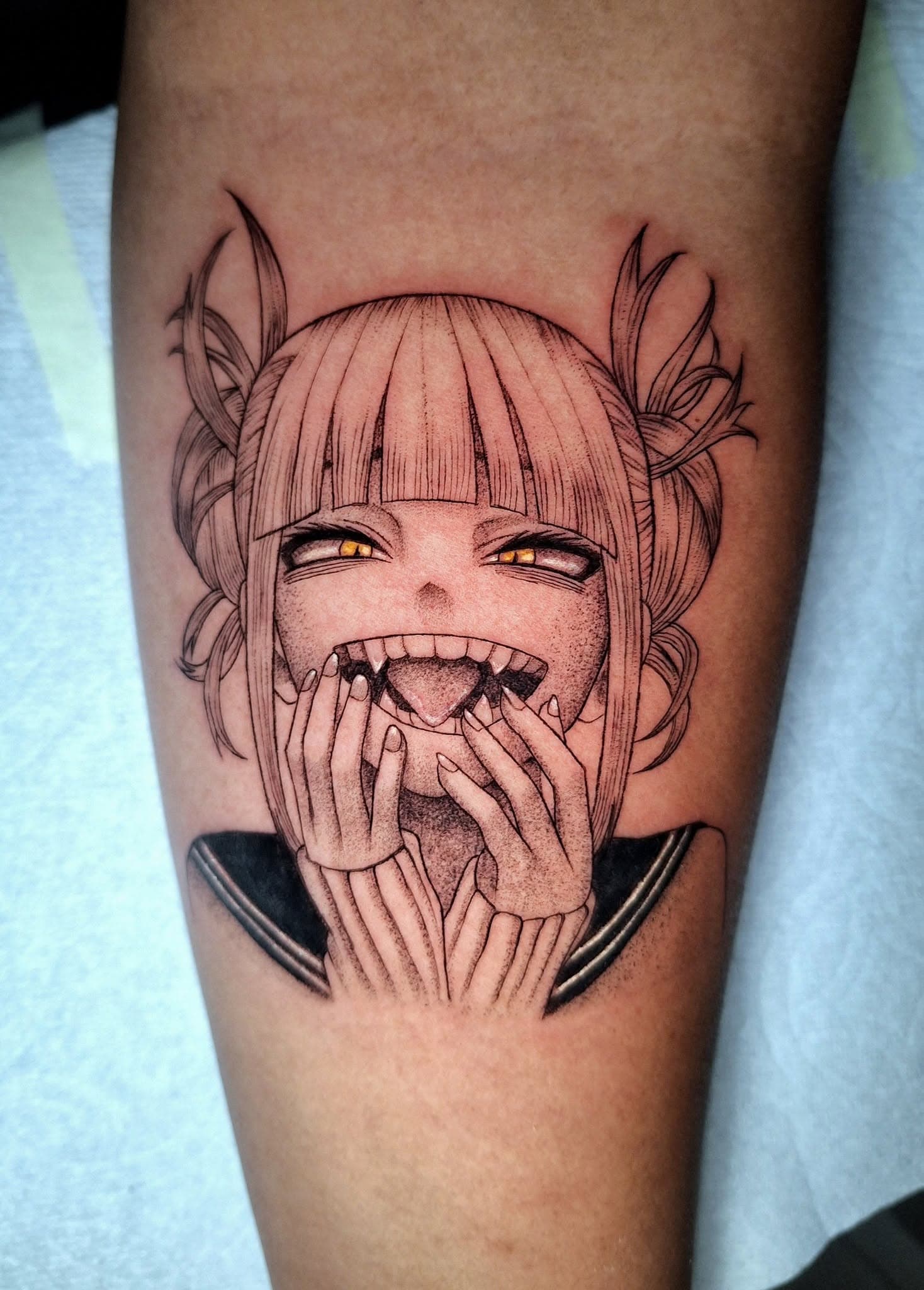 Fine-line anime-style tattoo of a female figure